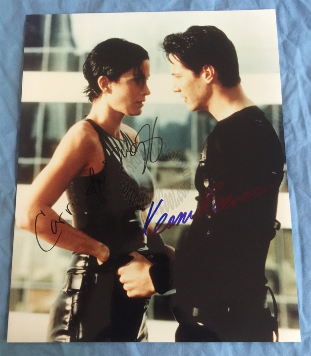 MATRIX AUTOGRAPHED 8X10 PHOTO - SIGNED BY KEANU REEVES and CARRIE-ANNE MOSS